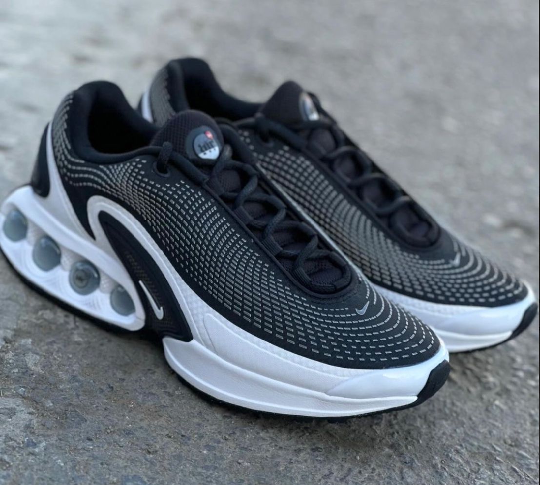 Nike Air Max DN - Negros con Blanco
